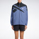 Campera Reebok Vector Open Hem
