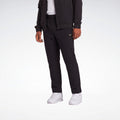 Pantalón Reebok Reece 4Way Stretch