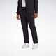 Pantalón Reebok Reece 4Way Stretch
